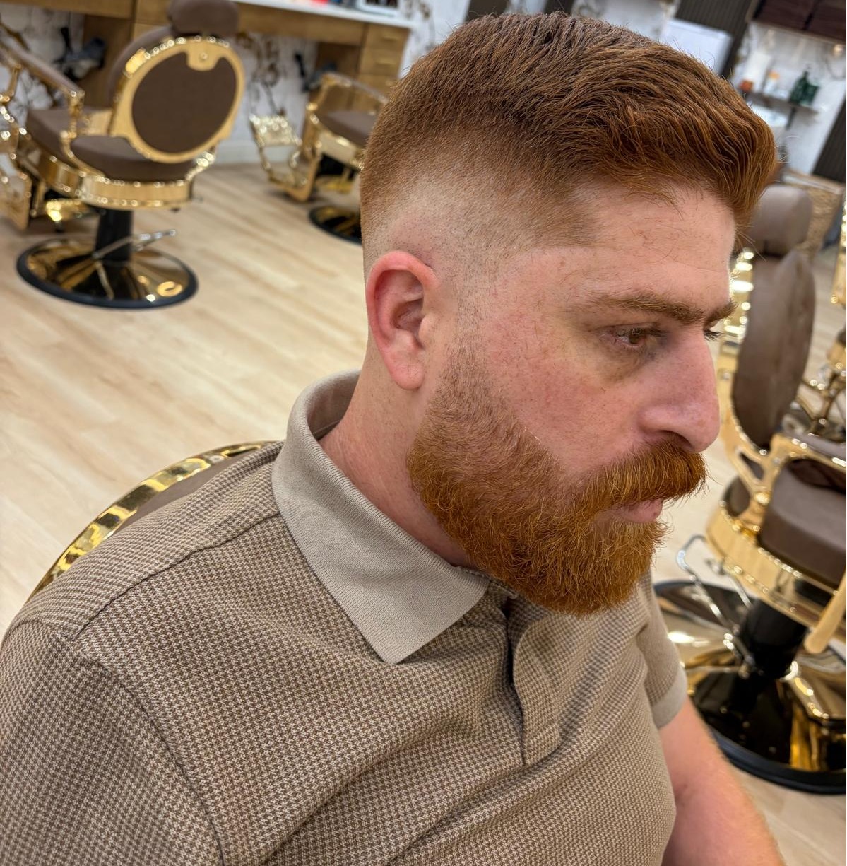 Barber delivering premium fade cut